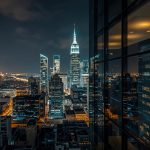 lucid-origin_glass_office_reflection_night_skyline-6