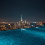 lucid-origin_infinity_pool_overlooking_city_lights_night-6