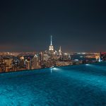 lucid-origin_infinity_pool_overlooking_city_lights_night-6